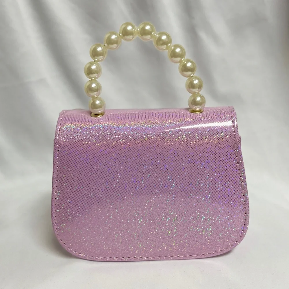 Hello Kitty Pink Glitter Purse, NIB, 6.5 x4.5”, crossbody strap incl, all ages